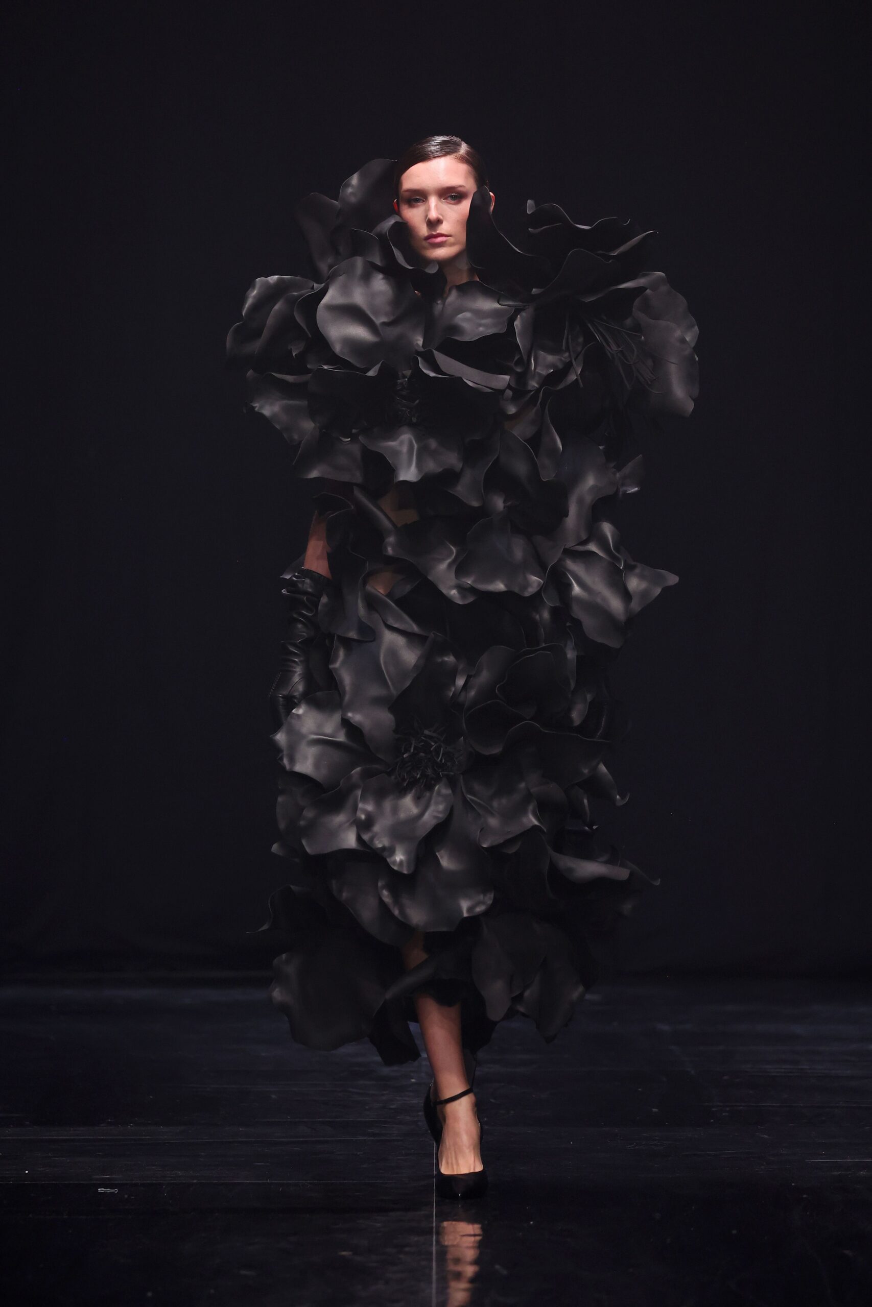 BERLIN, GERMANY - JANUARY 31: A model walks the runway at the COLLECTIVEFOUR Kilian Kerner fashion show during Berlin Fashion Week Autumn/Winter 2025 at Uber Eats Music Hall on January 31, 2025 in Berlin, Germany. (Photo by Sebastian Reuter/Getty Images for Kilian Kerner)