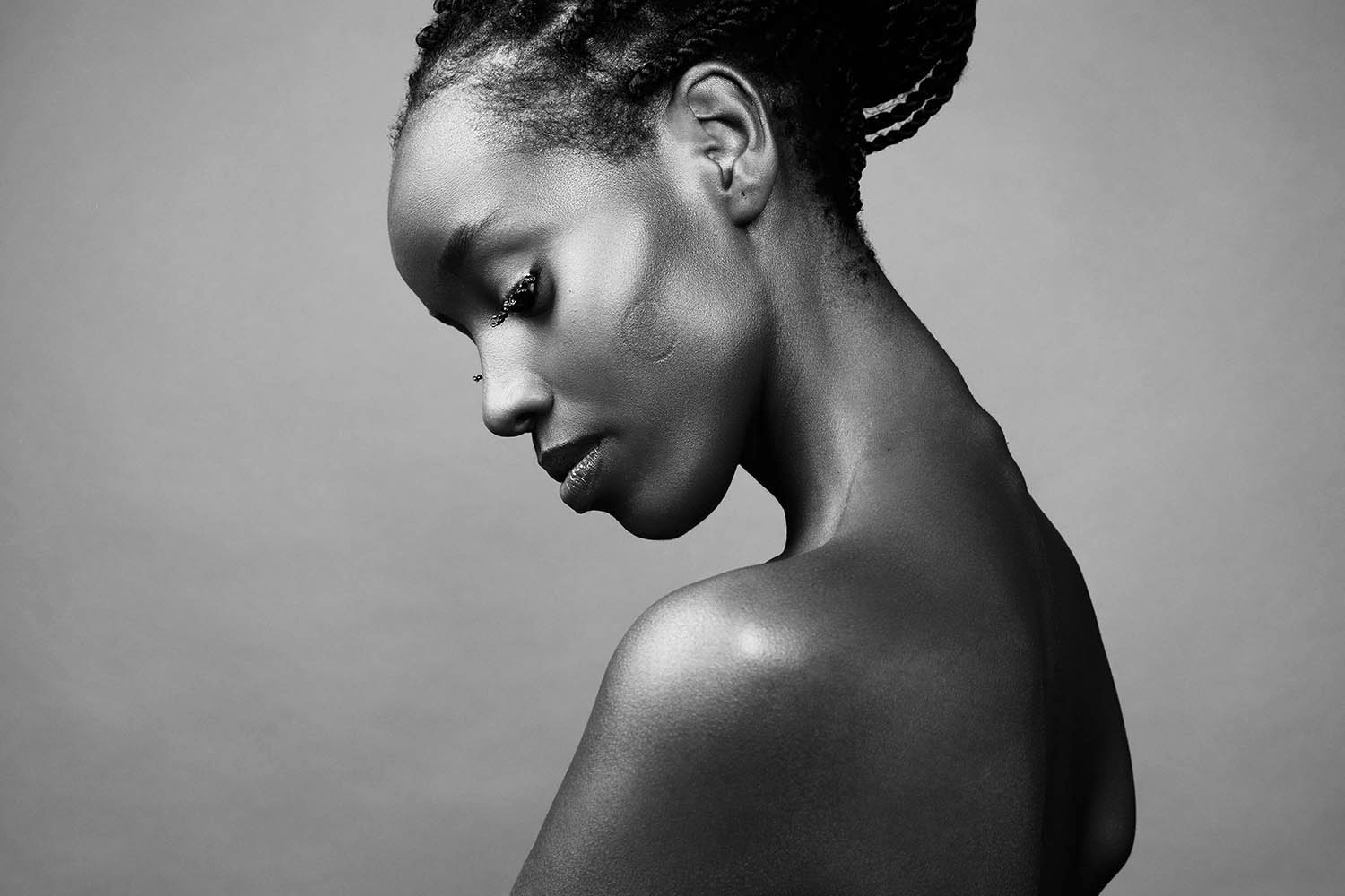 Crystallized editorial: soft side profile with clean styling and subtle crystal accents