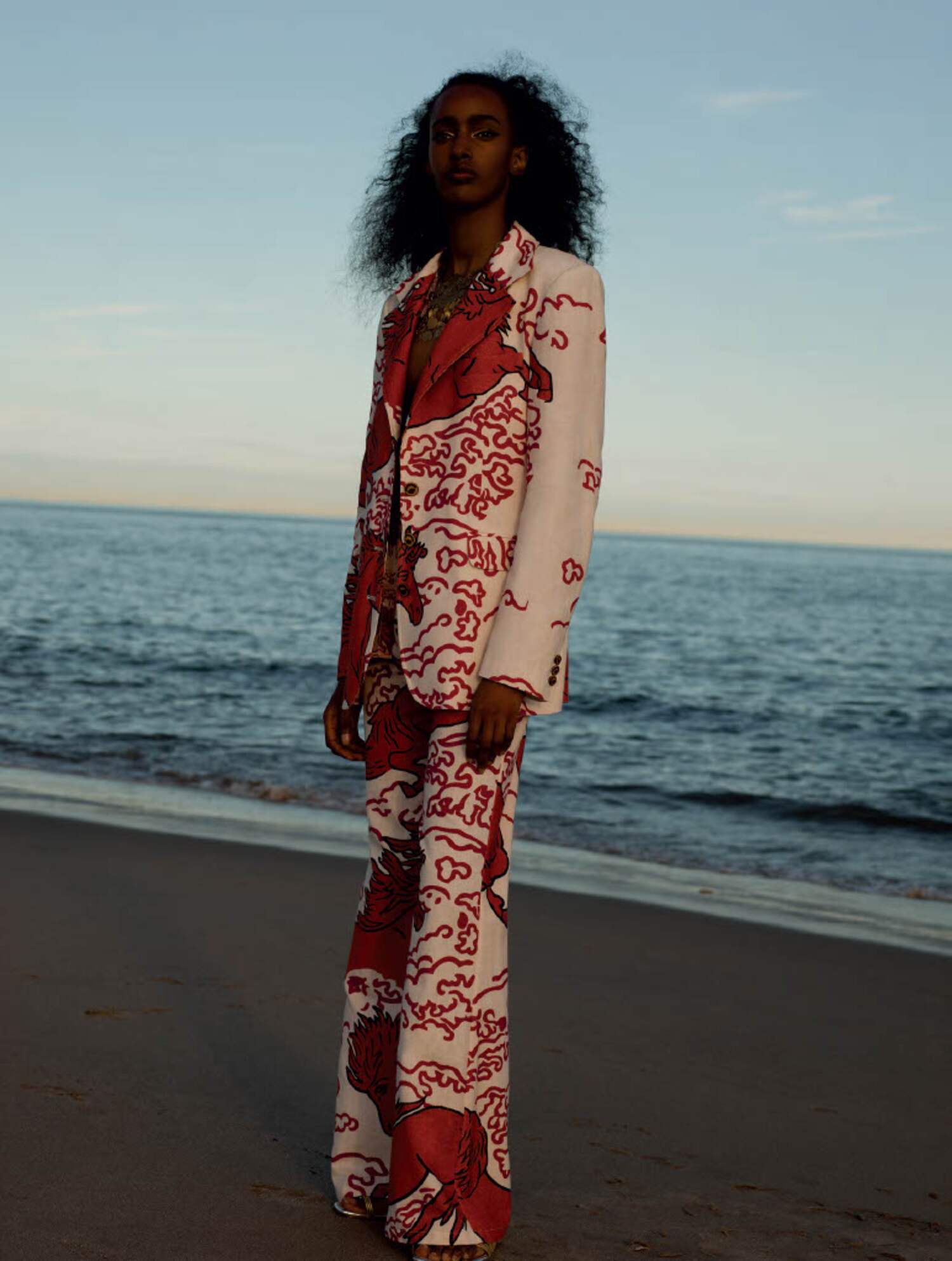 Tailored white suit with red Gustav Klimt inspired pattern from Alix of Bohemia Resort 2026 collection