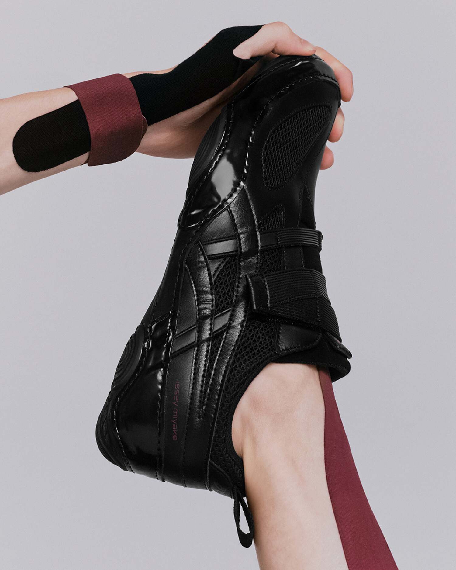 Close up of Black/Black detailing worn by model.